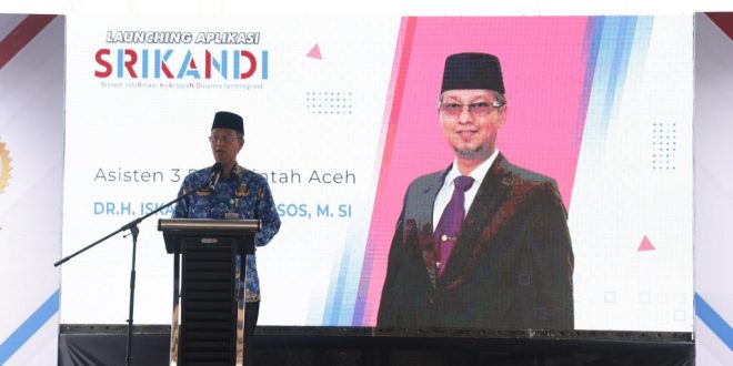 Asisten Administrasi Umum Sekda Aceh, Dr. H. Iskandar, AP, S.Sos, M.Si, menyampaikan sambutan sekaligus meluncurkan Aplikasi Srikandi, Aplikasi Telusur Arsip, dan Pembukaan Diorama Arsip, di Kantor Dinas Perpustakaan dan Kearsipan Aceh, Banda Aceh, Rabu (17/5/2023).