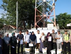 Pj Bupati Aceh Besar Salurkan Bantuan Pangan Kepada 3.389 KPM