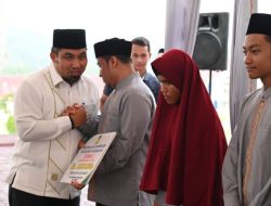 Pj Bupati Aceh Besar Serahkan Bonus Juara MTQ dan FASI