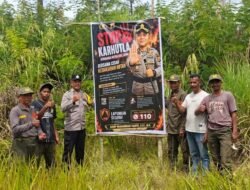 Personel Polres Aceh Tengah Pasang Spanduk Imbauan dan Sosialisasi Cegah Karhutla